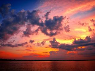 обои Раскрашенное вечернее небо над морем фото